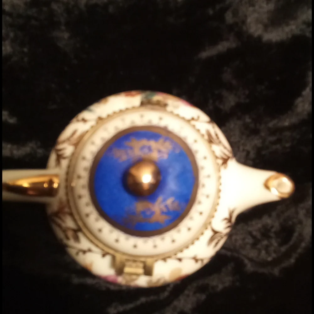 beautiful little Victorian tea pot jewelry holder